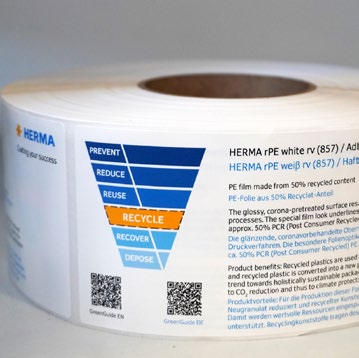 Roll of self-adhesive PE film made from 50% recycled material, labelled with recycling information and instructions.