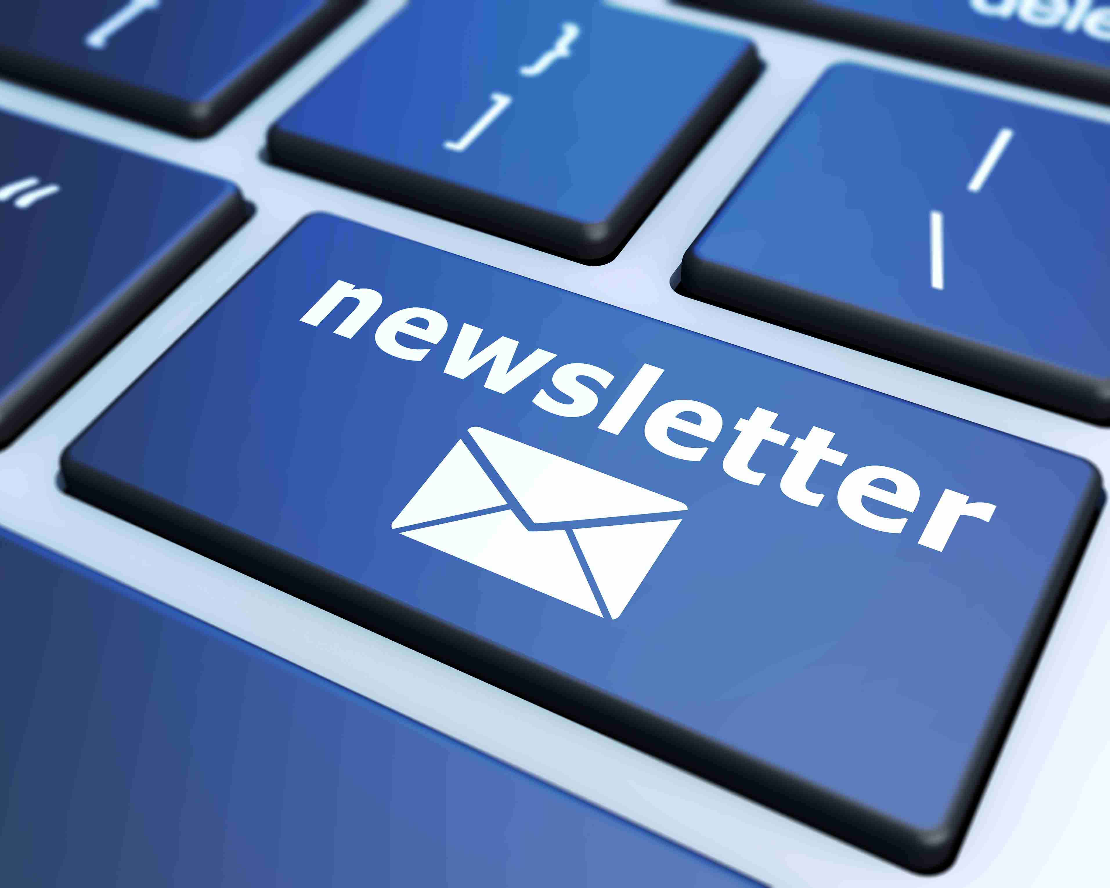 Keyboard with a blue key that displays the word 'newsletter' and an envelope icon.