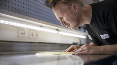 Employee checks a label in the lab.